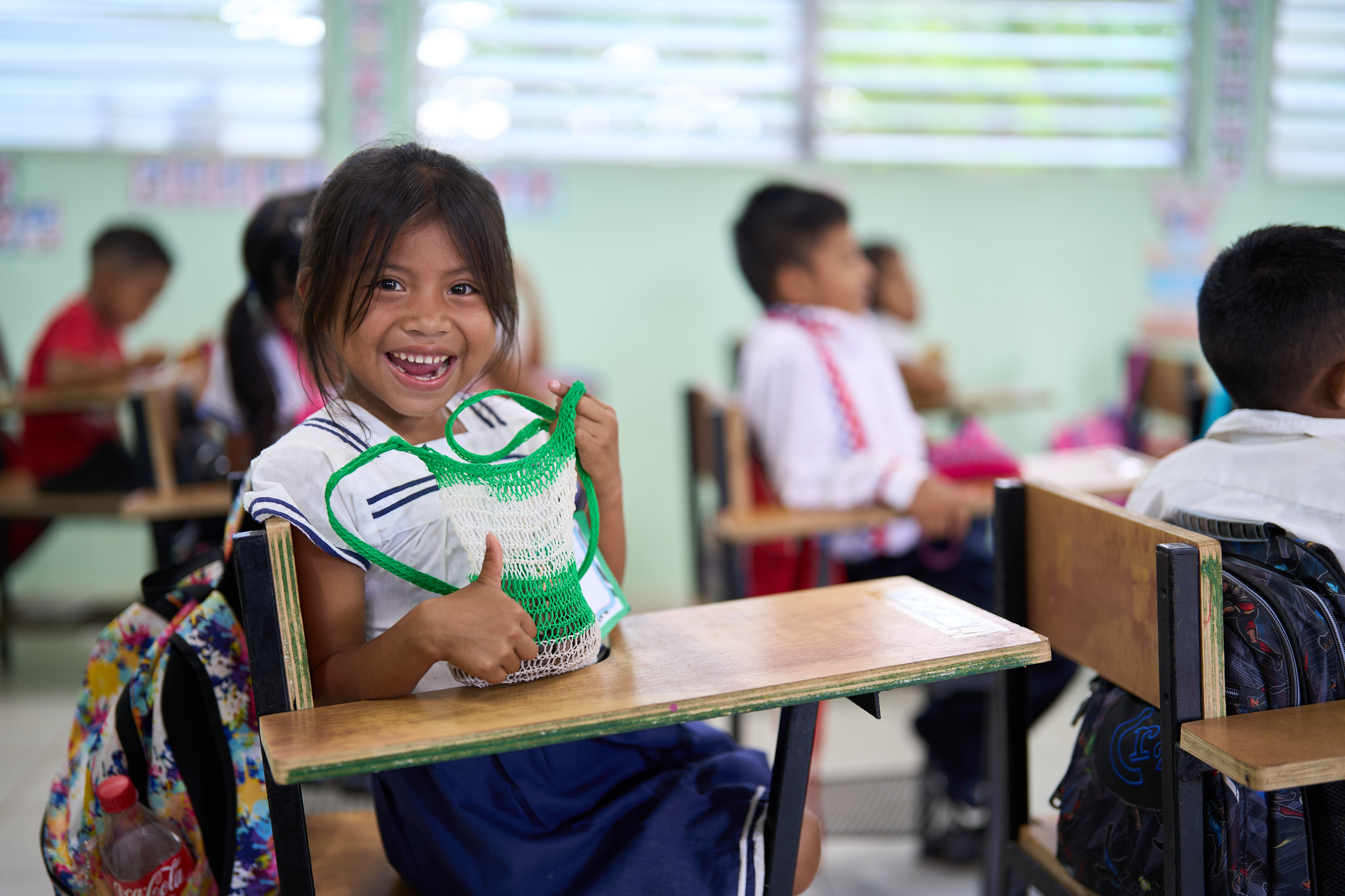bilingual-and-multicultural-55-IDB-teacher-student-enjoying