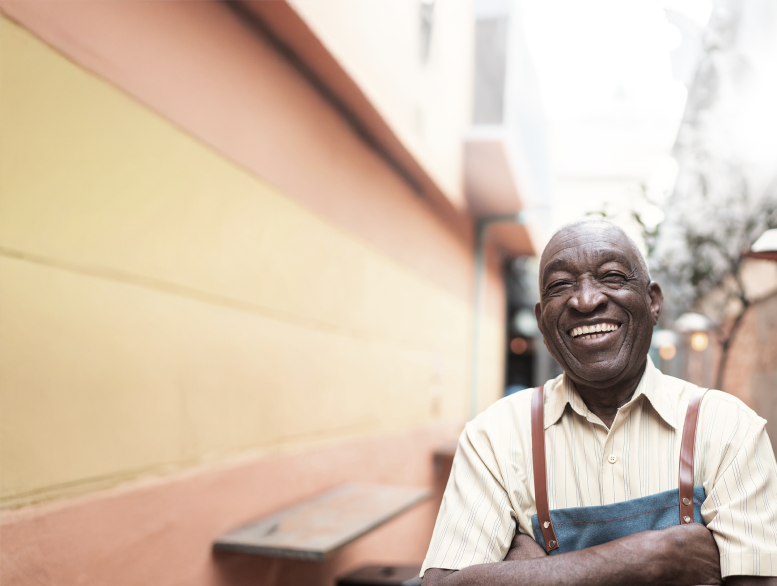 Old man smiling - What Works to Improve Government Efficiency - Inter American Development Bank - IDB