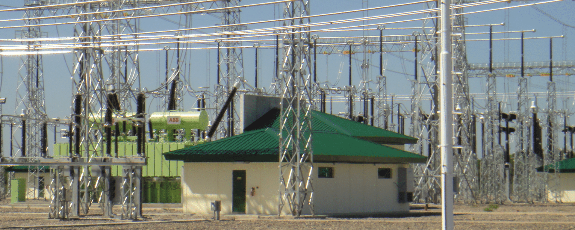 Small business owner assisting a customer at a hardware and electrical supplies store IDB
