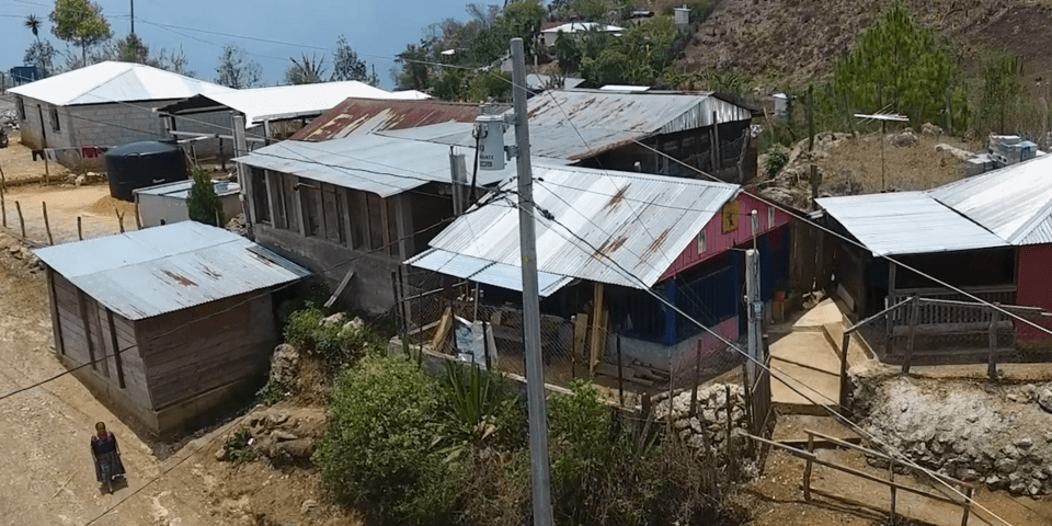 Houses over mountain - Inter American Development Bank - IDB Electricity