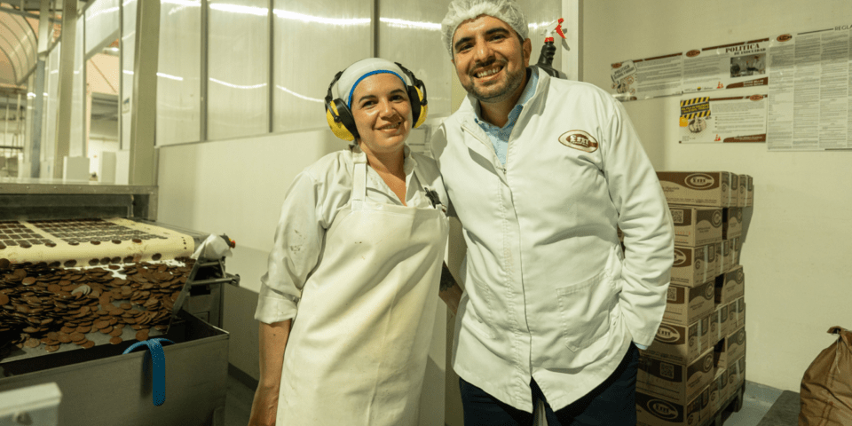 People smiling in a factory - Small Businesses - Inter American Development Bank - IDB