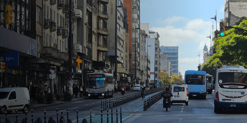 Montevideo street landscape with cars and buses - Inter American Development Bank - Transport Infrastructure