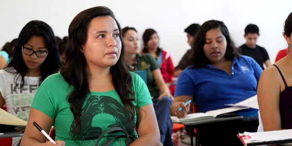 Adult women in a classroom.