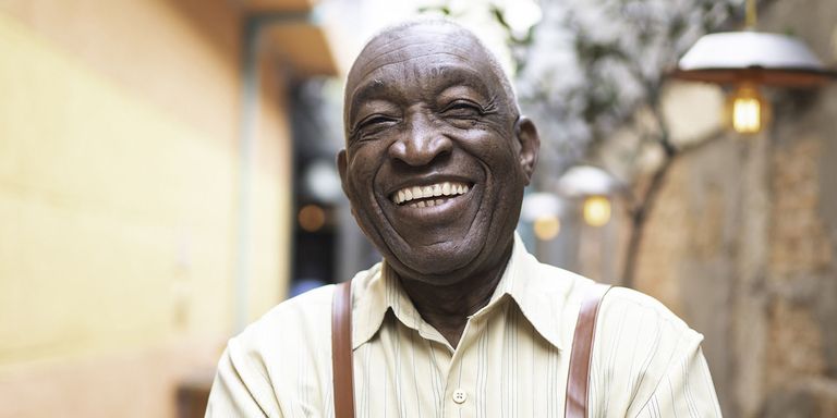 A man wearing an apron smiling. Healthcare - Inter-American Development Bank - IDB