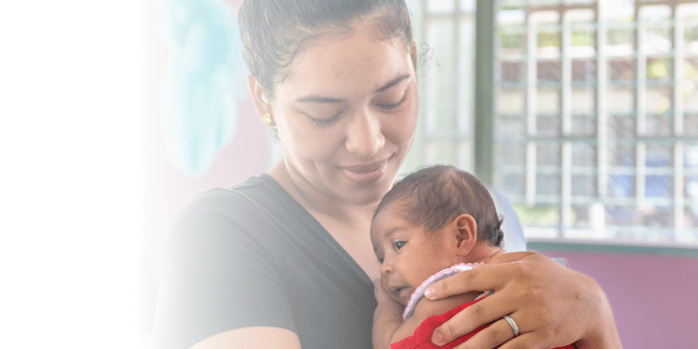 Mother taking care of her child - IDB Cares - Inter American Development Bank - IDB