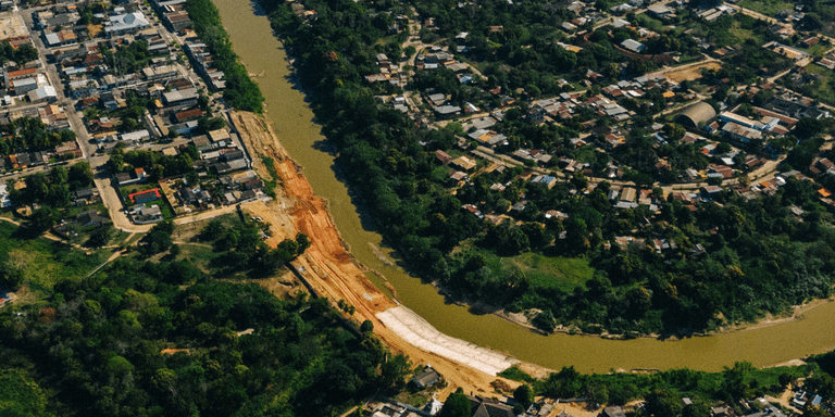 Amazon river with a town - Amazonian Cities - Inter American Development Bank - IDB