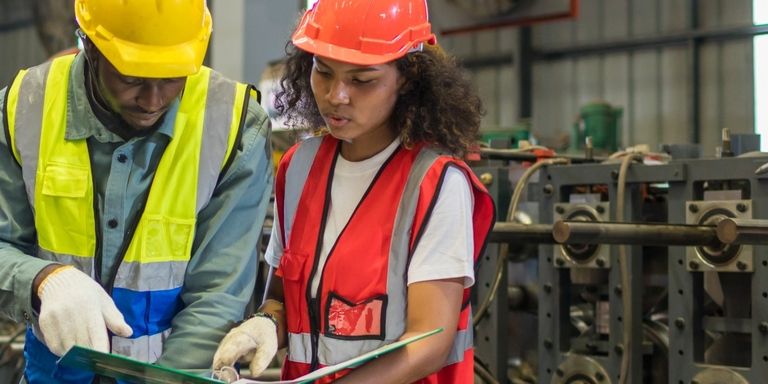 Persons working in a factory - Inter American Development Bank - IDB