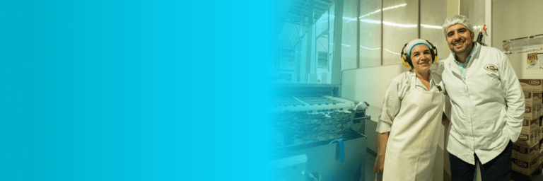 People smiling in a factory - Small Businesses - Inter American Development Bank - IDB