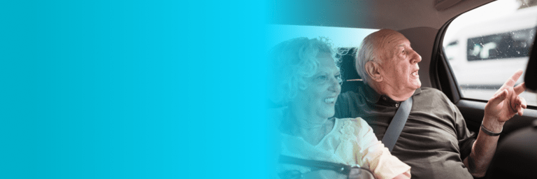 Seniors smiling aboard a vehicle - Inter American Development Bank - Healthcare