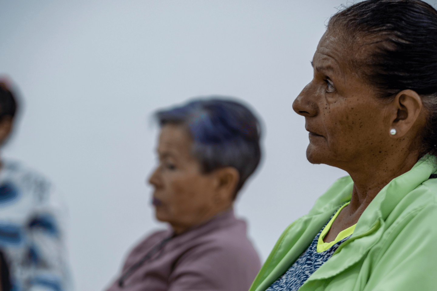 woman in green blouse 