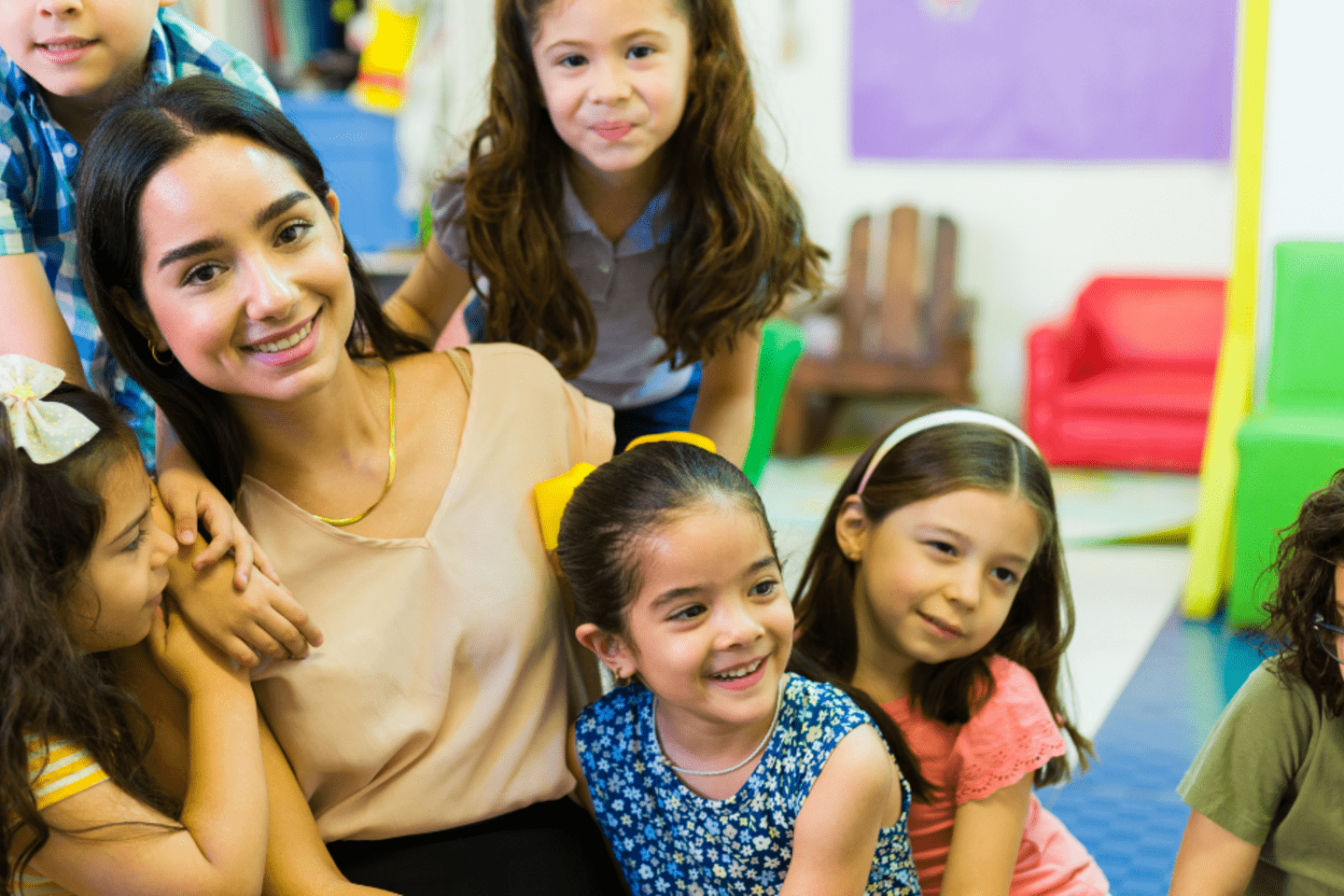 preschool teacher and her students 