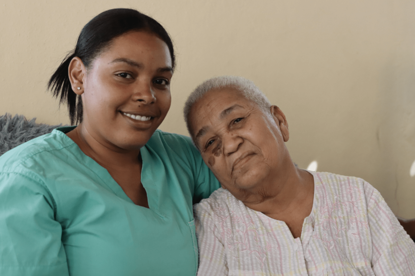 an older woman and her caregiver