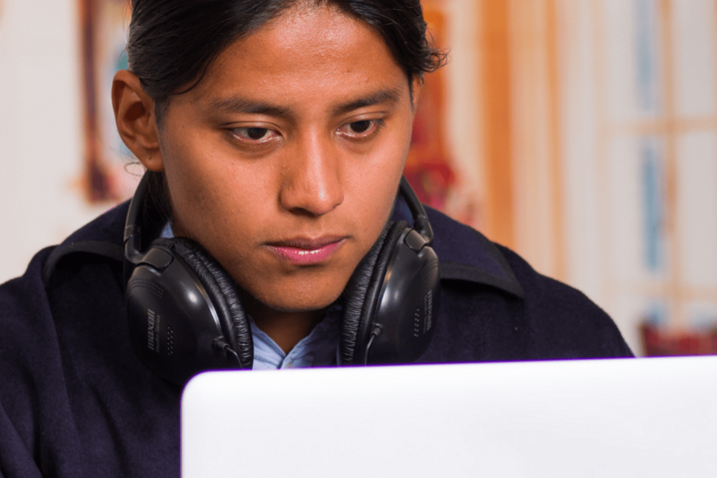 young man in his laptop
