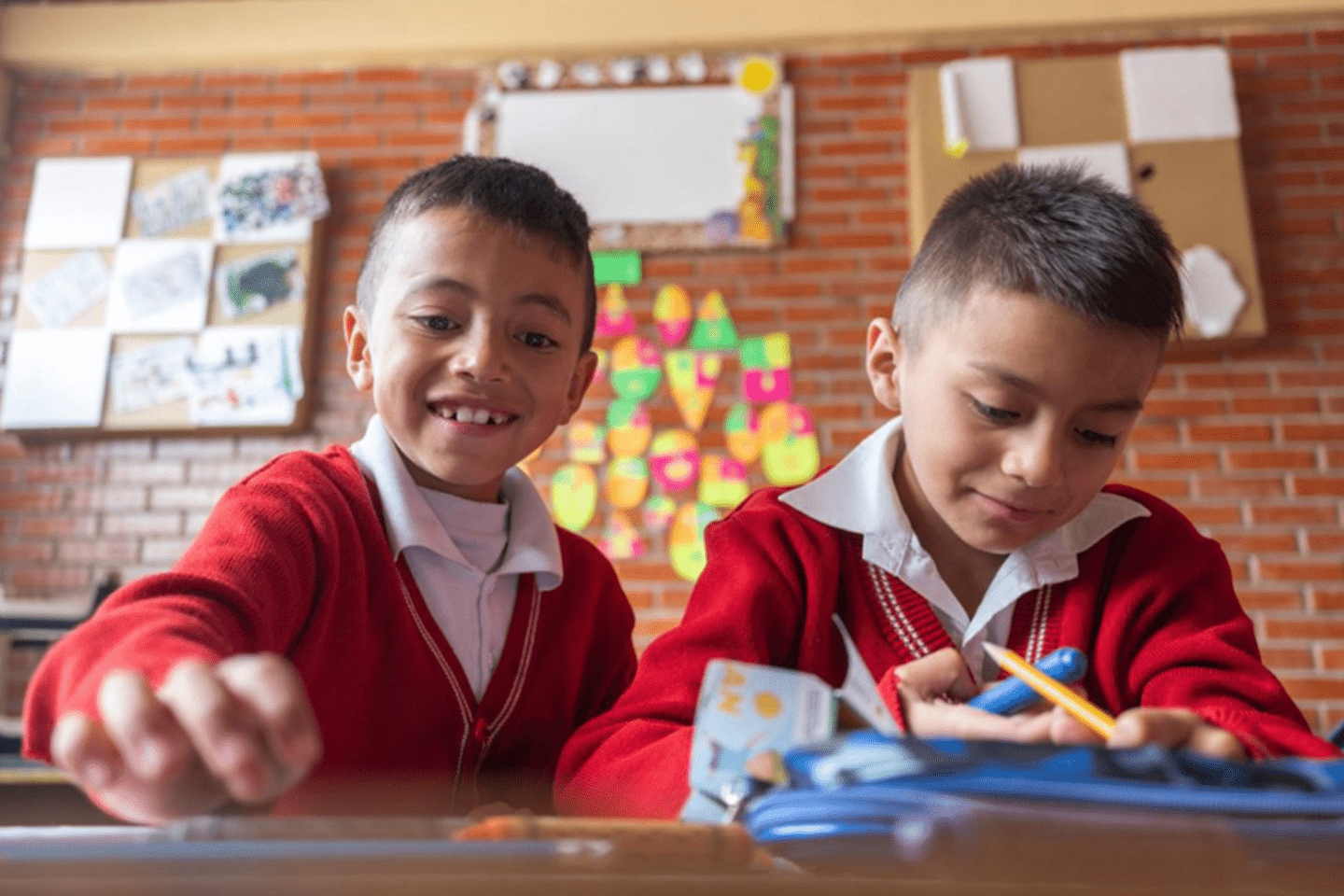 two boys playing in school 