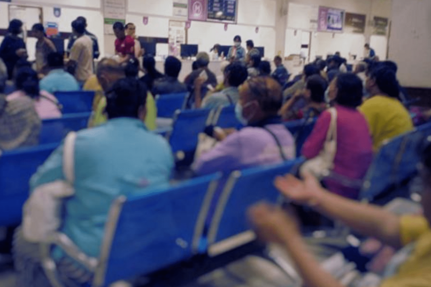 people waiting in a lobby