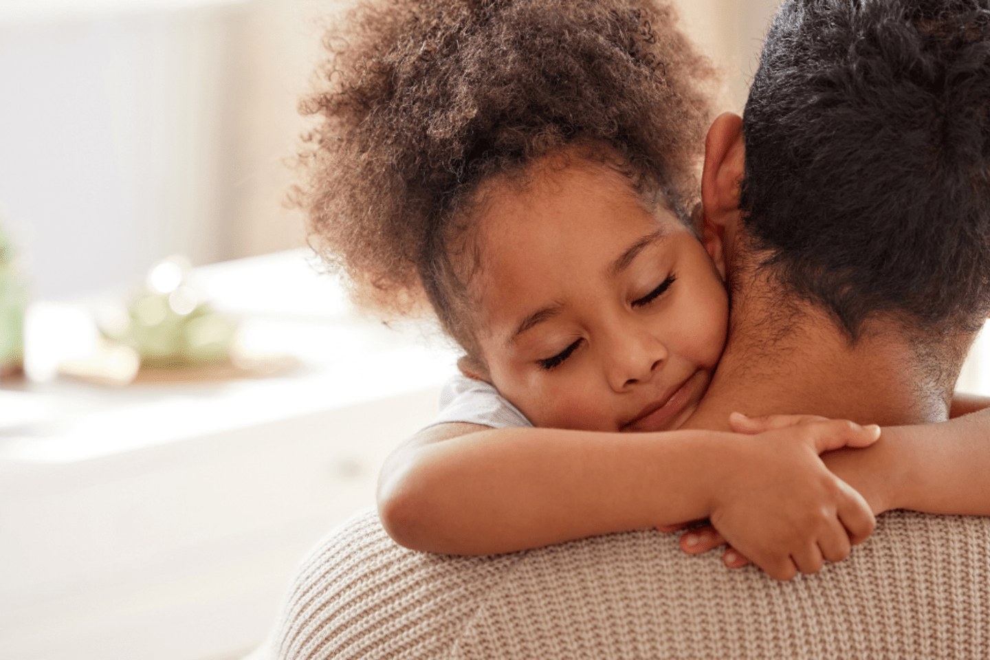 a man holding his daughter