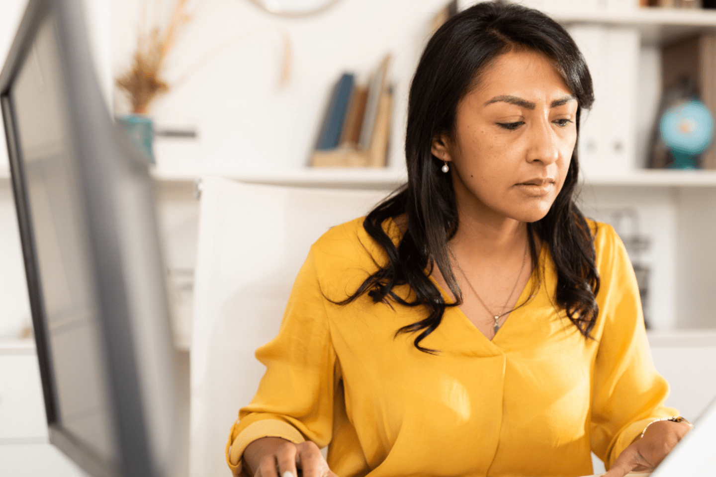woman working on her computer