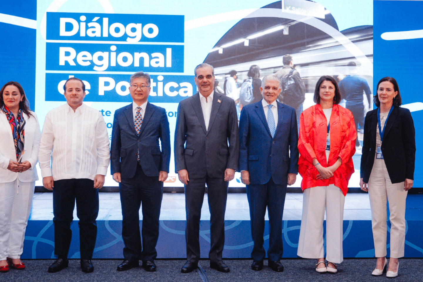 Authorities and representatives from the IDB and ITF pose on stage during the opening of the Regional Policy Dialogue in Santo Domingo