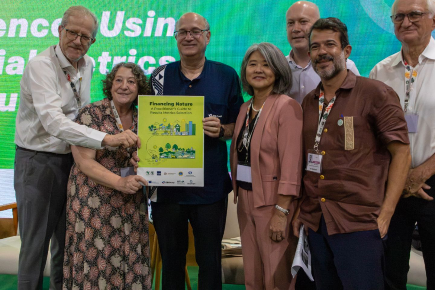 group photo of stakeholders holding the guidance during the launch