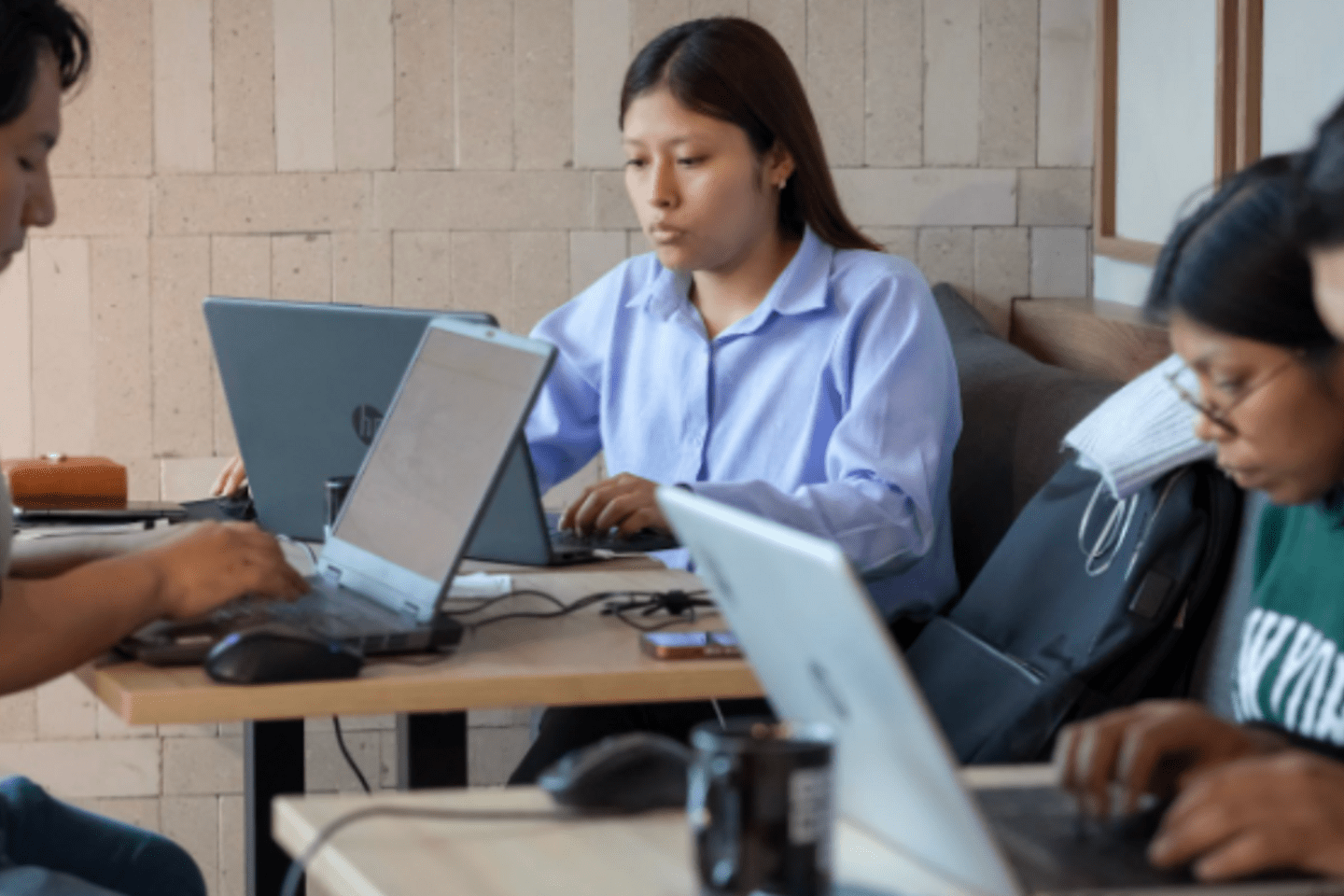 Group of people working on their laptop computers.