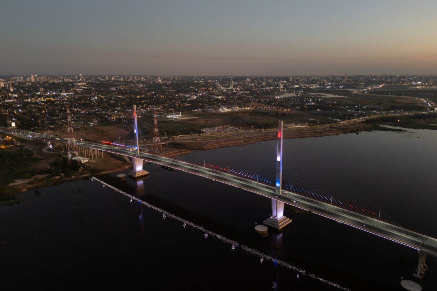 Night aerial view of a modern bridge in Asuncion