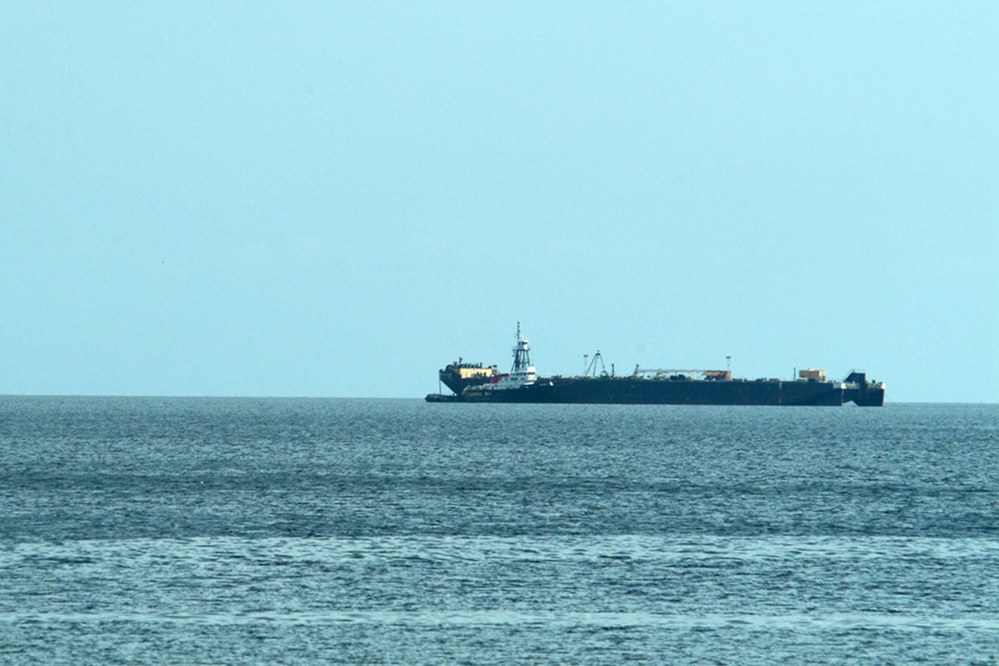 Oil tanker near an offshore oil platform