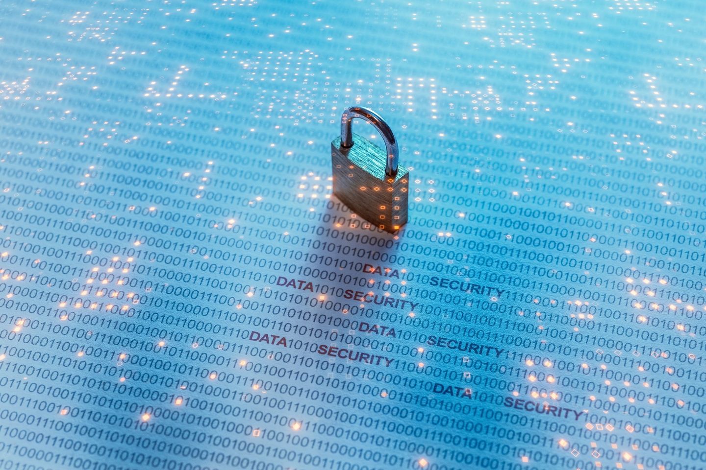 A padlock on a luminous surface reminiscent of an electronic circuit board.