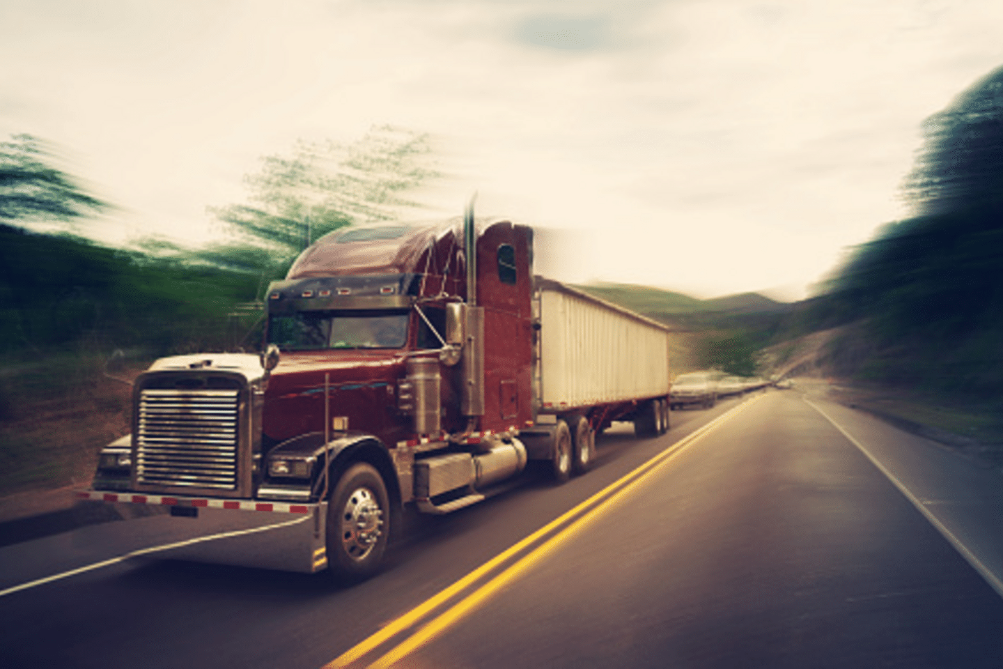 A truck traveling at high speed along a road in Costa Rica.