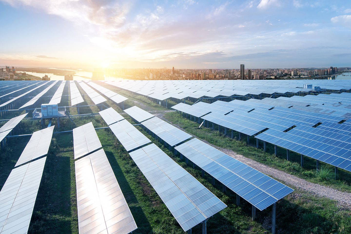 Eco-environmentally friendly green energy of sustainable development of solar power plant with Shanghai skyline