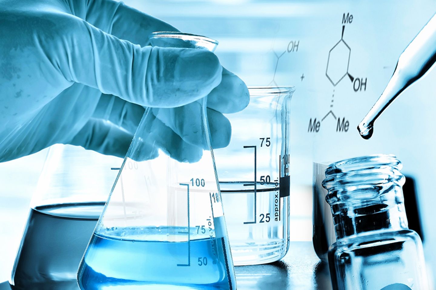 Flask,In,Scientist,Hand,With,Test,Tubes,In,Laboratory