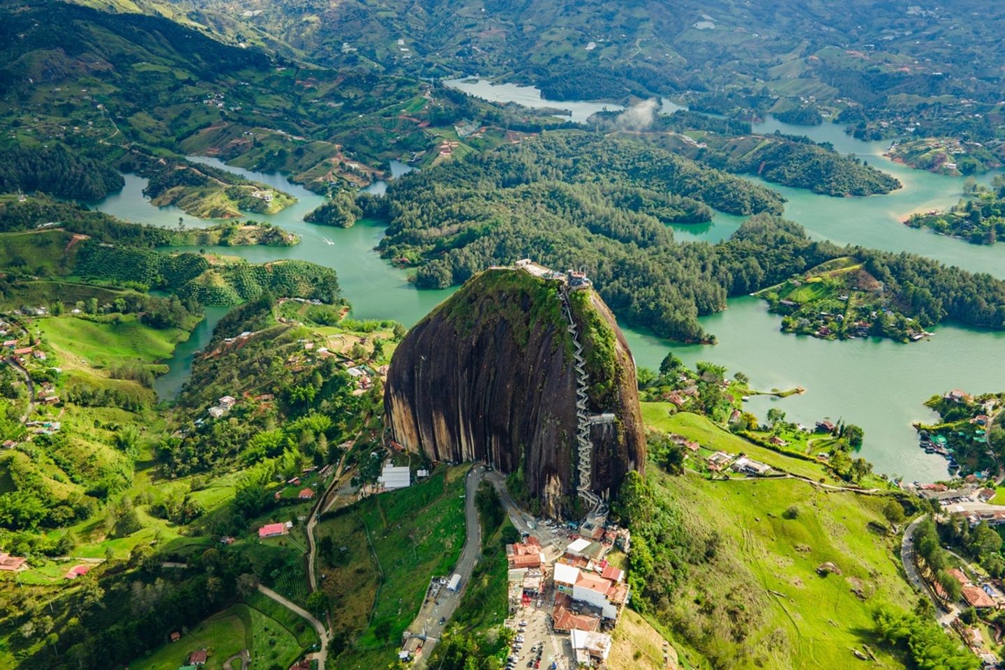 Aerial,View,Of,The,Peñol,Stone,Next,To,The,Lake