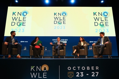 a group of people sitting on a stage  - Inter-American Development Bank - IDB