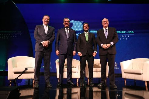 A group of men standing on a stage. Institutional Strengthening - Inter-American Development Bank - IDB