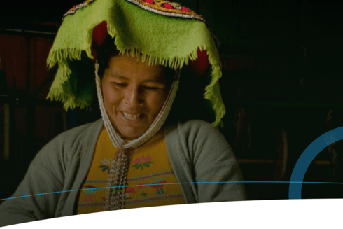 Woman with a hat smiling - Development Effectiveness Policy Framework - Inter American Development Bank - IDB