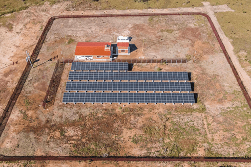Aerial view of solar panels and houses - Inter American Development Bank - Amazonia
