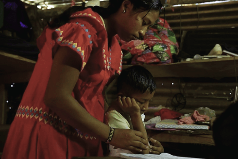 Indigenous teacher with a student - Education Initiatives - Inter American Development Bank - IDB