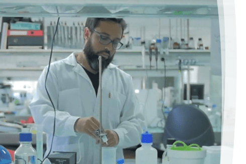 Man working on a lab - Portfolio Results - Inter American Development Bank - IDB