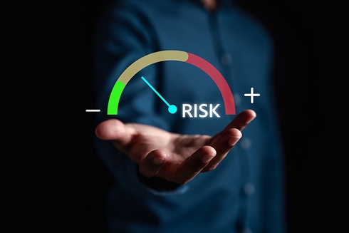 Palm of a man's hand with a graphic above it - Inter American Development Bank - Disaster Risk Management