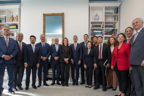 Group photo of representatives participating in a regional institutional meeting IDB