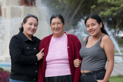 Healthcare worker with an older adult receiving care services IDB