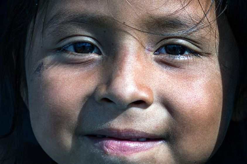 a close up of a child's face