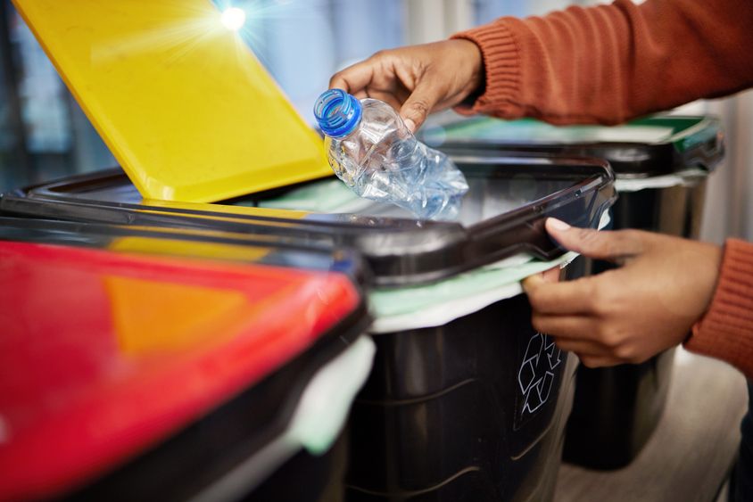 Hand recycling a plastic bottle - Solid waste - Inter American Development Bank - IDB