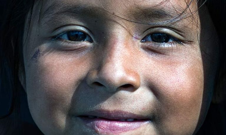 a close up of a child's face