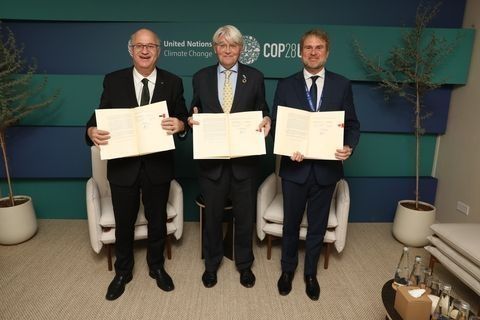 President of the IDB, Ilan Goldfajn; UK Minister of State for International Development, Andrew Mitchel and CEO of IDB Invest, James Scriven, during signing of agreement.