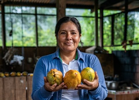 woman holding cacao